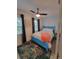 Bedroom with light blue bed frame and starfish rug at 4801 14Th S Ave, St Petersburg, FL 33711