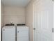 Laundry room with side-by-side washer and dryer at 12163 Cattleside Dr, Riverview, FL 33579