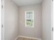 Bright small room with window and neutral walls at 12163 Cattleside Dr, Riverview, FL 33579