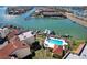 Stunning aerial view showcasing the pool and marina at 126 1St E St # 209, Tierra Verde, FL 33715