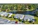 Condos near a lake with parking at 129 Camphor Cir # F, Oldsmar, FL 34677