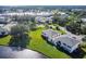 Condos nestled by a lake, near shopping at 129 Camphor Cir # F, Oldsmar, FL 34677