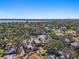 Aerial view of a house near the water, nestled in a tree-lined neighborhood at 1530 22Nd S Ave, St Petersburg, FL 33705