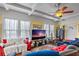 Living room with hardwood floors, high ceilings, and comfortable seating at 1530 22Nd S Ave, St Petersburg, FL 33705