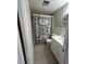 Clean bathroom with shower/tub combo and vanity at 2215 Riomar Dr, Holiday, FL 34691