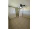 Bright bedroom with double closet and ceiling fan at 2215 Riomar Dr, Holiday, FL 34691