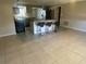 Spacious kitchen with an island and modern appliances at 2215 Riomar Dr, Holiday, FL 34691