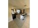 Modern kitchen with granite countertops and an island at 2215 Riomar Dr, Holiday, FL 34691