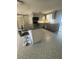 Updated kitchen with breakfast bar and stylish tile flooring at 2215 Riomar Dr, Holiday, FL 34691
