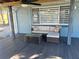 Relaxing patio with sectional sofa and coffee table at 2215 Riomar Dr, Holiday, FL 34691