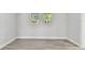 Well-lit bedroom with neutral walls and wood-look flooring at 2412 38Th W Ave, Bradenton, FL 34205
