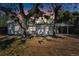 Updated single-story home with a covered carport and mature landscaping at 2412 38Th W Ave, Bradenton, FL 34205