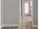 Hallway with door leading to the kitchen at 2412 38Th W Ave, Bradenton, FL 34205