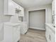 Modern kitchen with white shaker cabinets and quartz countertops at 2412 38Th W Ave, Bradenton, FL 34205