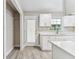 Modern kitchen with white shaker cabinets and quartz counters at 2412 38Th W Ave, Bradenton, FL 34205