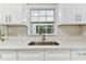 Kitchen sink with stainless steel faucet and quartz countertop at 2412 38Th W Ave, Bradenton, FL 34205