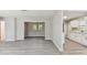 Open floor plan connecting the living room to the kitchen and dining areas at 2412 38Th W Ave, Bradenton, FL 34205