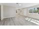 Bright living room featuring neutral walls and wood-look floors at 2412 38Th W Ave, Bradenton, FL 34205
