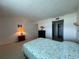 Comfortable bedroom with carpet flooring, a spacious closet, and a serene atmosphere for restful nights at 2617 Cove Cay Dr # 505, Clearwater, FL 33760