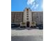 Attractive building with a well-maintained facade, featuring a convenient carport and lush landscaping at 2617 Cove Cay Dr # 505, Clearwater, FL 33760