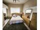 Cozy bedroom with a double bed and wood dresser at 2912 W Main St, Tampa, FL 33607