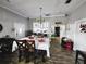 Bright dining room with a wooden table and chandelier at 2912 W Main St, Tampa, FL 33607