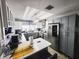Modern kitchen featuring gray cabinets and white countertops at 2912 W Main St, Tampa, FL 33607