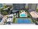 Aerial view of building, pool, and tennis court at 2912 W Santiago St # 404, Tampa, FL 33629