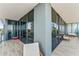Large balcony with multiple seating areas and water views at 2912 W Santiago St # 404, Tampa, FL 33629