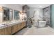 Spa-like bathroom with marble finishes and soaking tub at 2912 W Santiago St # 404, Tampa, FL 33629