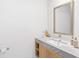 Modern bathroom with a gray marble vanity and a large mirror at 2912 W Santiago St # 404, Tampa, FL 33629