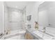 Spa-like bathroom with a large walk-in shower and marble tile at 2912 W Santiago St # 404, Tampa, FL 33629