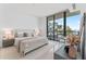 Spacious bedroom with water views and ensuite bathroom at 2912 W Santiago St # 404, Tampa, FL 33629