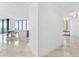 Bright and airy entryway with marble flooring and modern light fixtures at 2912 W Santiago St # 404, Tampa, FL 33629