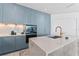 Gourmet kitchen with blue cabinetry and high-end appliances at 2912 W Santiago St # 404, Tampa, FL 33629