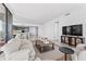Bright living room showcasing modern decor and water views at 2912 W Santiago St # 404, Tampa, FL 33629