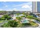 Resort-style pool and hot tub with lush landscaping at 2912 W Santiago St # 404, Tampa, FL 33629