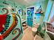 Ocean-themed bathroom with artistic tilework and fixtures at 3022 56Th S St, Gulfport, FL 33707