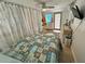 Cozy bedroom with seashell bedding and ocean-themed decor at 3022 56Th S St, Gulfport, FL 33707