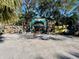 Quaint property entrance with unique gate and landscaping at 3022 56Th S St, Gulfport, FL 33707