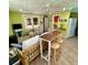 Open living space with a unique wooden bar and seating at 3022 56Th S St, Gulfport, FL 33707