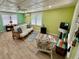 Relaxing living room with light and airy feel, featuring bamboo furniture at 3022 56Th S St, Gulfport, FL 33707