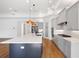 Kitchen with large center island, pendant lights, and modern appliances at 34 Concord Dr, Dunedin, FL 34698