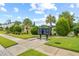 Community mailboxes on a well maintained common area and manicured sidewalk at 34 Concord Dr, Dunedin, FL 34698