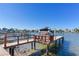 Private boat dock with covered boat lift at 405 12Th Ave, Indian Rocks Beach, FL 33785