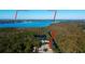 Aerial perspective highlighting waterfront homes and the Gulf of Mexico at 4331 Brooker Creek Dr, Palm Harbor, FL 34685