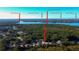 Aerial view of houses near Lake Tarpon, Clearwater Beach, and the Gulf of Mexico at 4331 Brooker Creek Dr, Palm Harbor, FL 34685