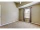 Bright bedroom with neutral walls, carpeted floor, and window with curtains at 4331 Brooker Creek Dr, Palm Harbor, FL 34685