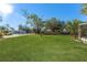 Large grassy backyard with mature trees at 5100 3Rd S Ave, St Petersburg, FL 33707