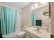 Clean bathroom with tub, shower, and vanity at 6188 80Th N St # 303, St Petersburg, FL 33709